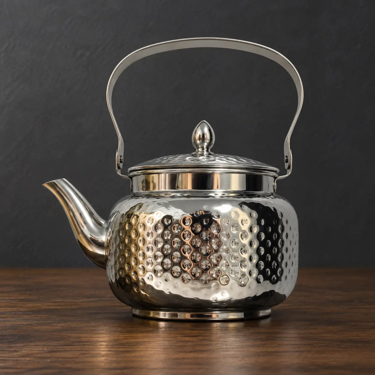 Silver Lily Style C teapot with a hammered body, metal swing handle and pointed lid finial