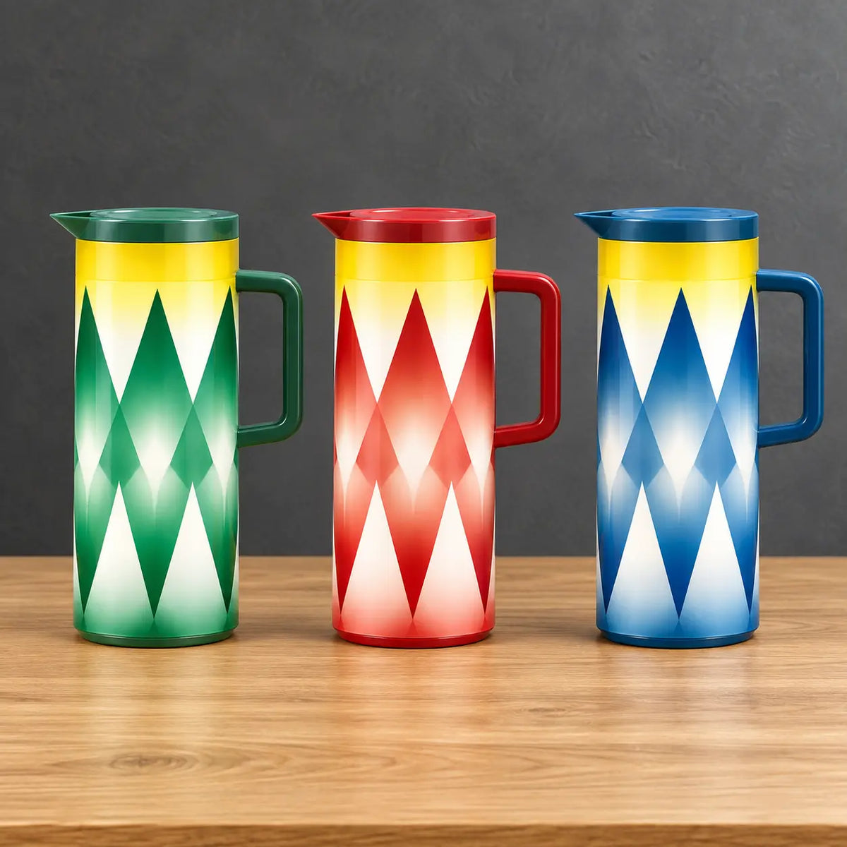 Three one-liter iron-shell thermos bottles with green, red, and blue gradient geometric prints, fitted lids, and side handles