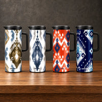 Four one-liter iron-shell thermos bottles with coordinated Ikat-style geometric prints, fitted lids, and side handles