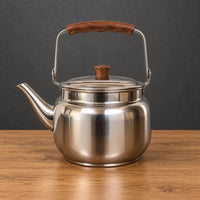 Silver Lily Style B teapot with a wooden handle grip, wooden lid knob and curved spout