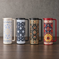 Two pictured one-liter iron-shell thermos bottles with metallic botanical vine graphics, gold-tone lids, and side handles