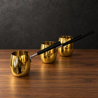 Silver drum-shaped stainless steel milk cups with black handles
