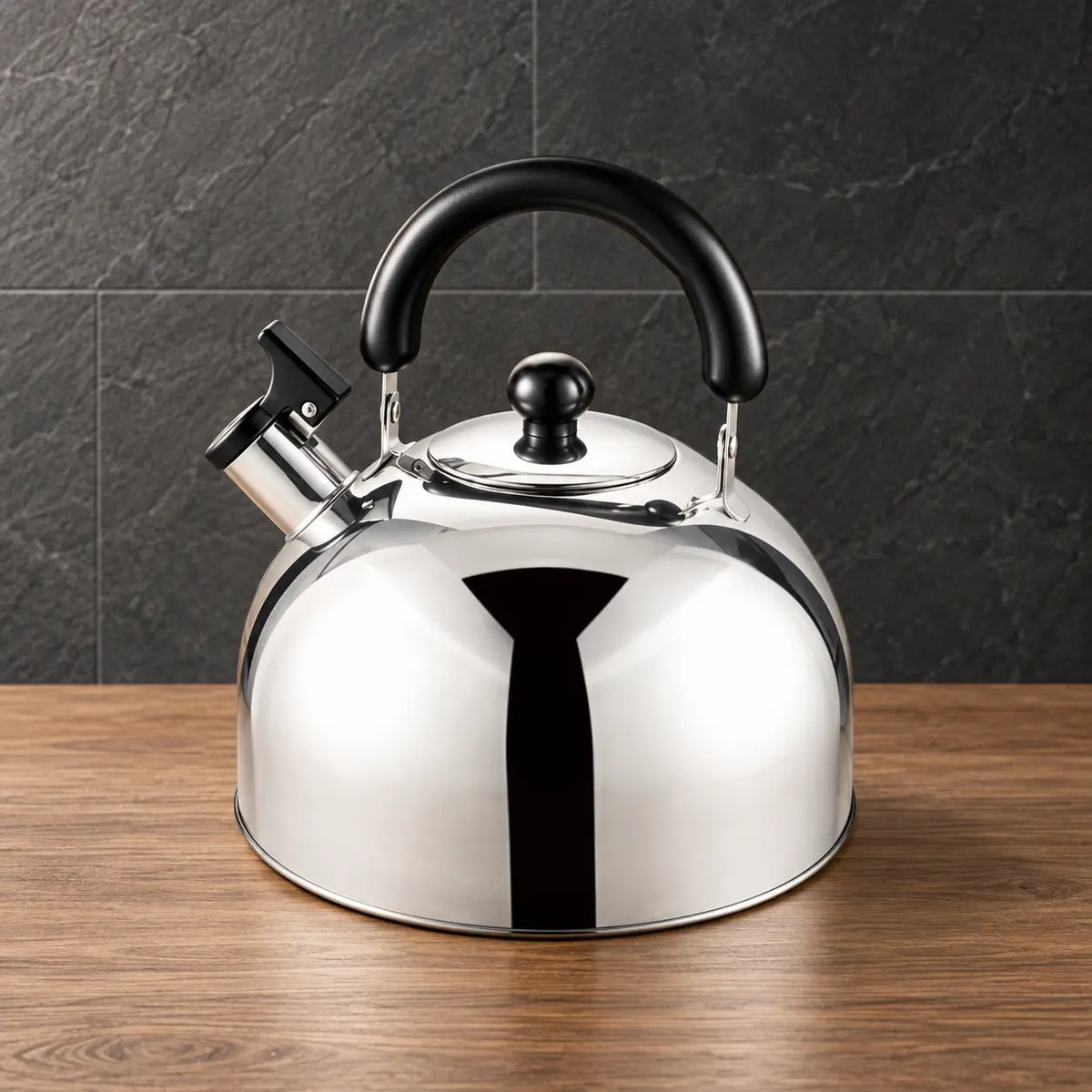Silver Type A thickened flat-bottom kettle with a rounded body, black arched handle, fitted lid, and angled spout