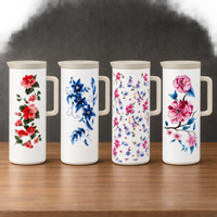 One-liter plastic-shell thermos bottles with watercolor-style floral prints, fitted lids, and side handles